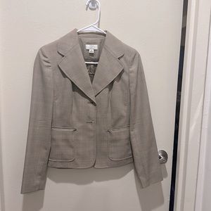 Tan light pattern skirt suit set. Lightly used, great condition